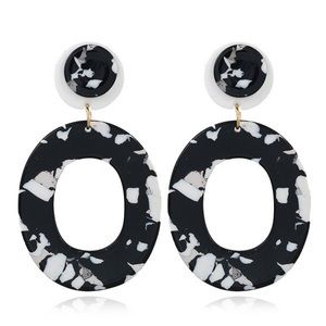 Acrylic resin drop earrings in black and white